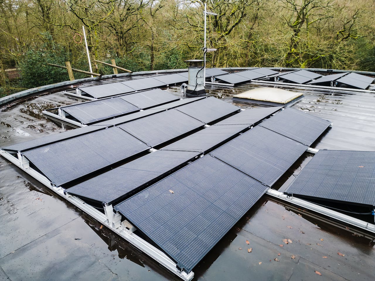 heros-img Rooftop solar panels in a natural setting, showcasing renewable energy solutions.